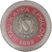 Tau Kappa Epsilon fraternity coin in an AirTite holder